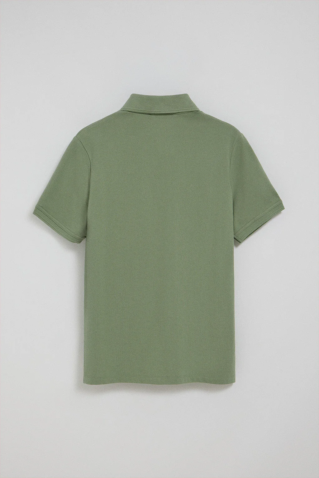 Jade-green polo shirt with three buttons and Rigby Go embroidered logo - Image 7