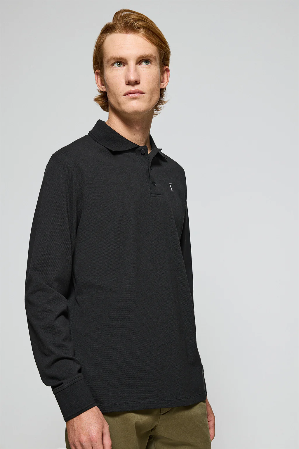 Black long-sleeve polo shirt with three buttons and Rigby Go logo