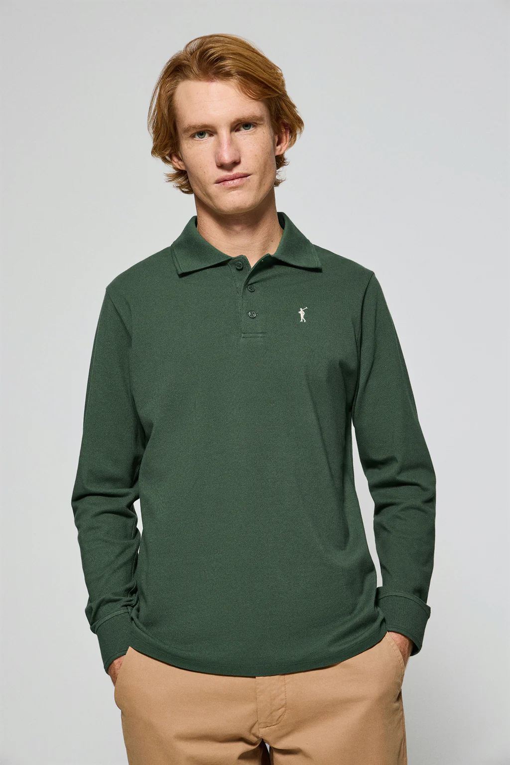 Green long-sleeve polo shirt with three buttons and Rigby Go logo