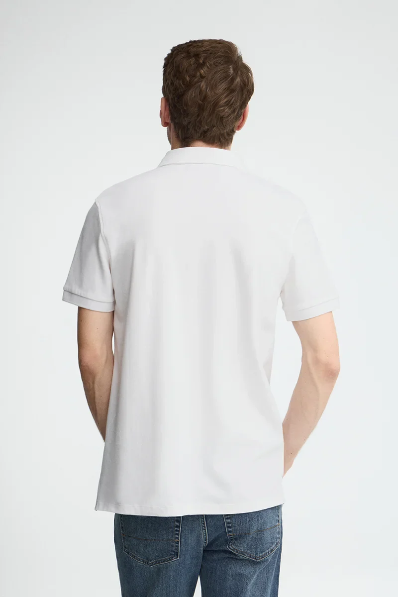 White slim-fit polo shirt with Rigby Go embroidery - Image 4