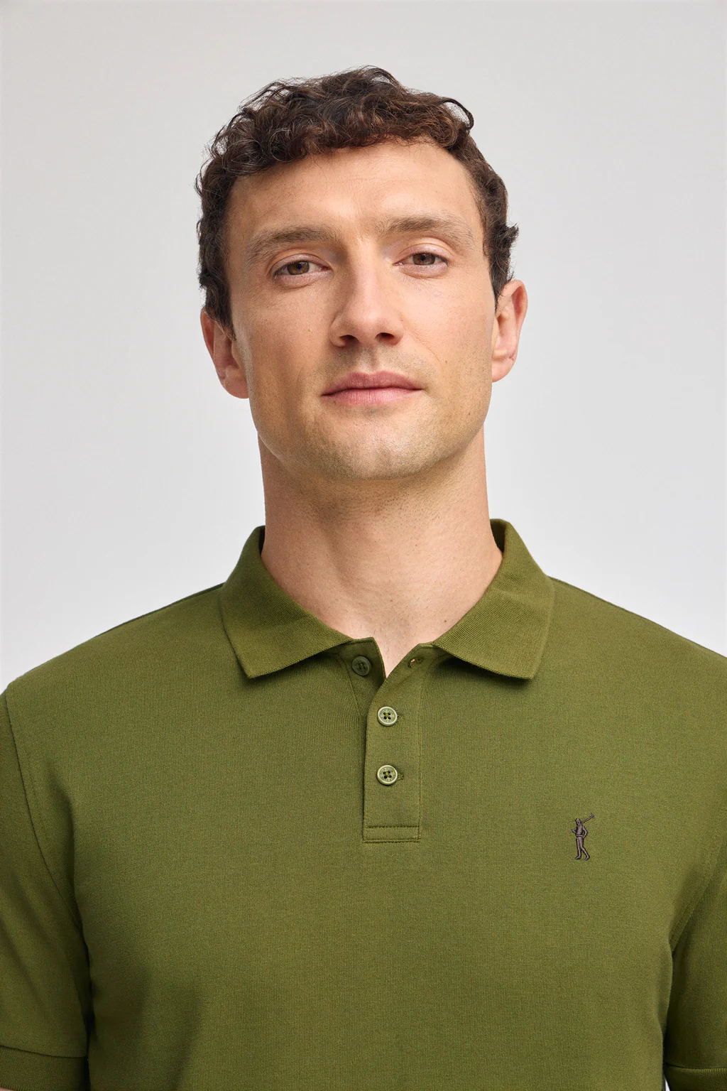 Green polo shirt with Rigby Go embroidery - Image 3