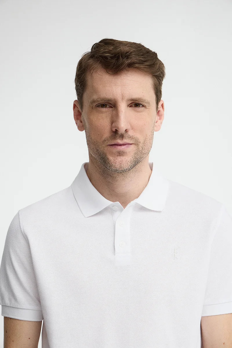 White cotton-linen polo shirt with Rigby Go embroidery