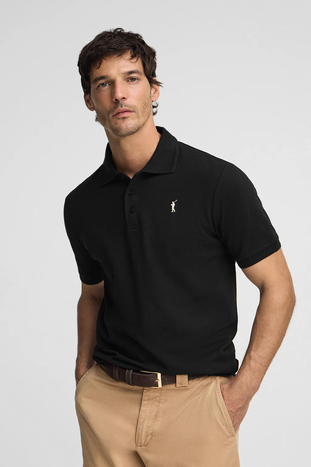 Black pique polo shirt with Rigby Go embroidered logo