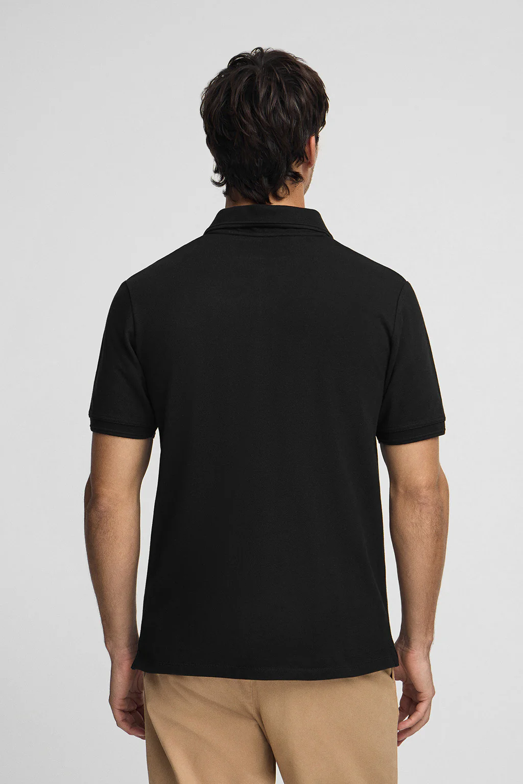 Black pique polo shirt with Rigby Go embroidered logo - Image 4