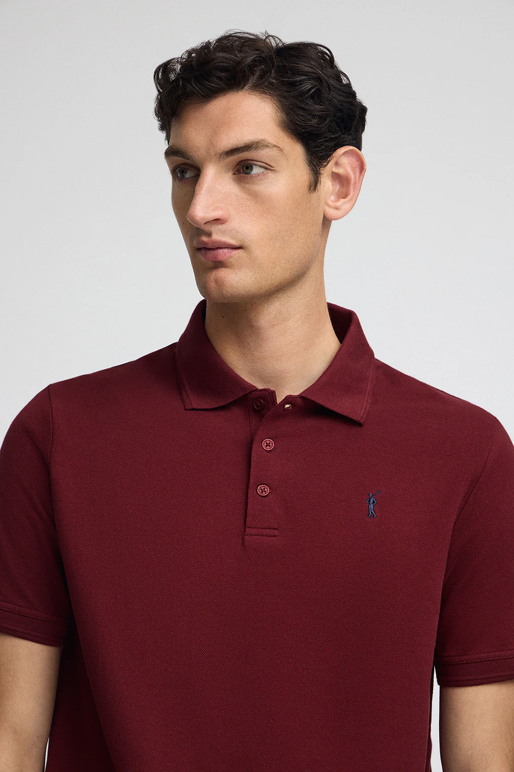 Maroon pique polo shirt with Rigby Go embroidered logo