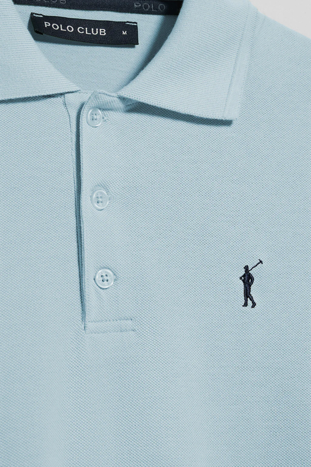 Light-blue short-sleeve polo shirt with three buttons and Rigby Go embroidered logo - Image 8