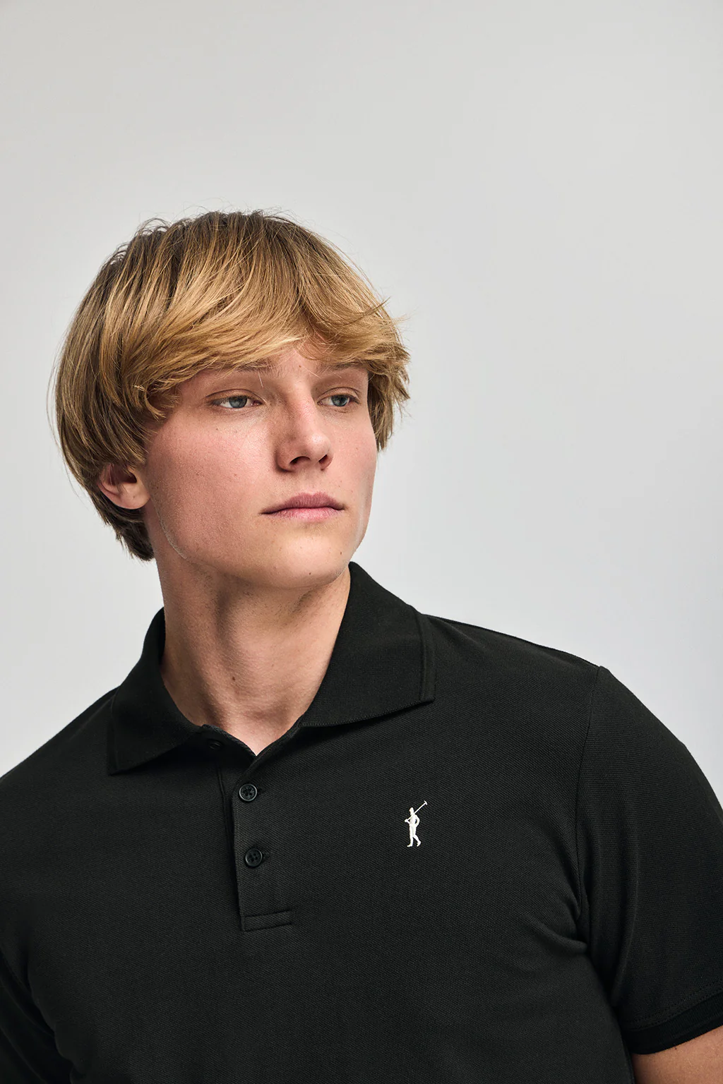 Black short-sleeve polo shirt with three buttons and Rigby Go embroidered logo - Image 3