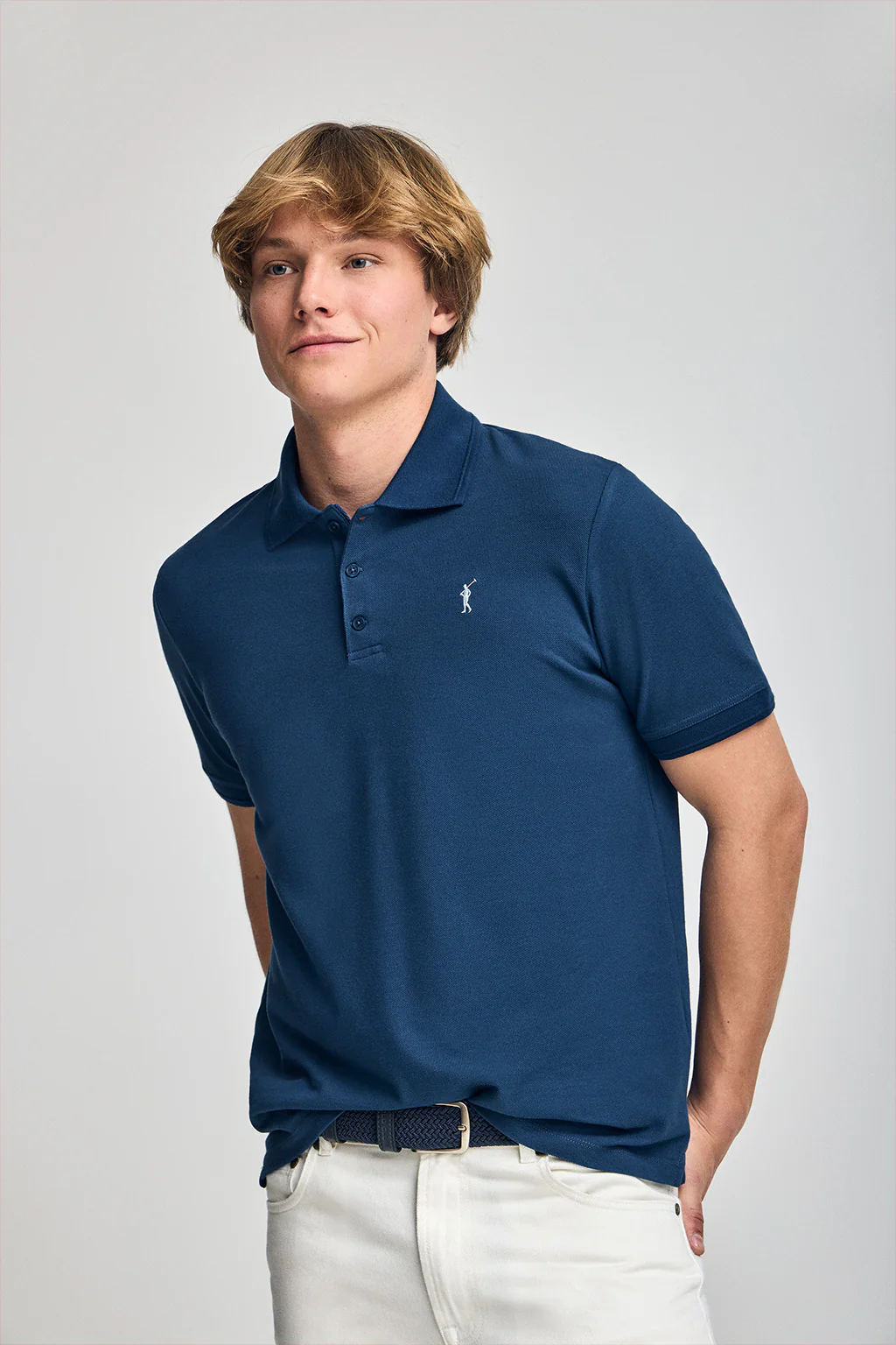 Indigo-blue short-sleeve polo shirt with three buttons and Rigby Go embroidered logo - Image 2