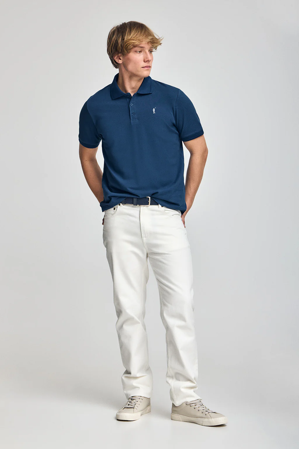 Indigo-blue short-sleeve polo shirt with three buttons and Rigby Go embroidered logo - Image 4