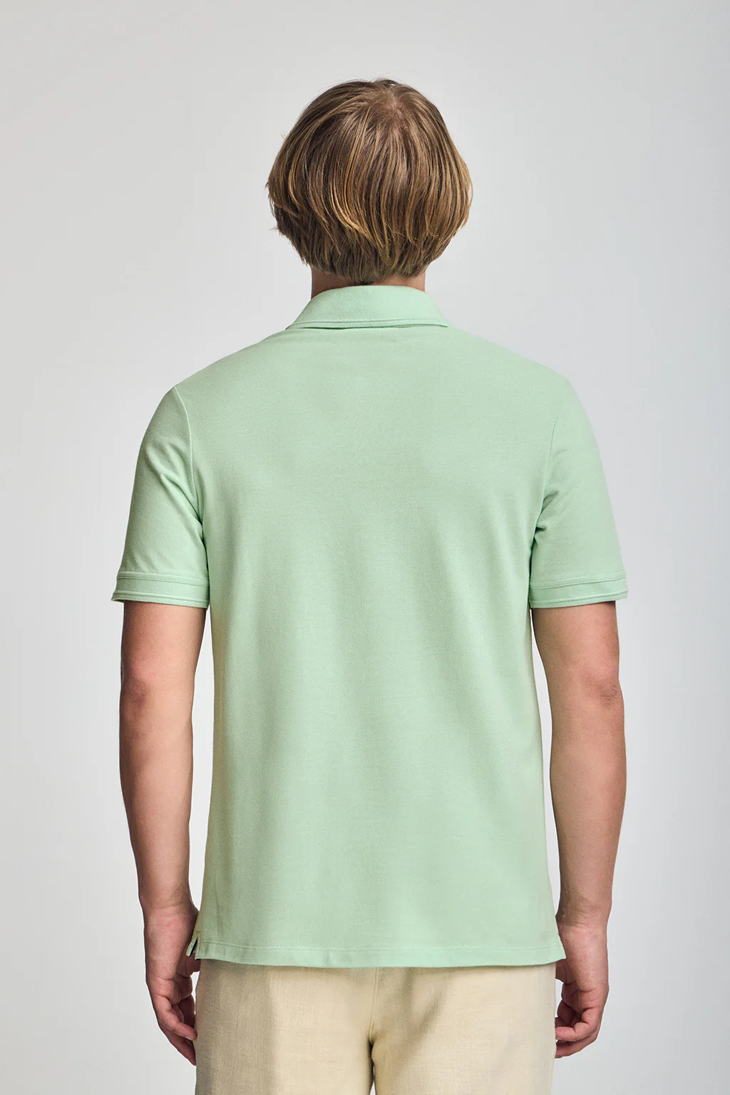 Mint short-sleeve polo shirt with three buttons and Rigby Go embroidered logo - Image 2
