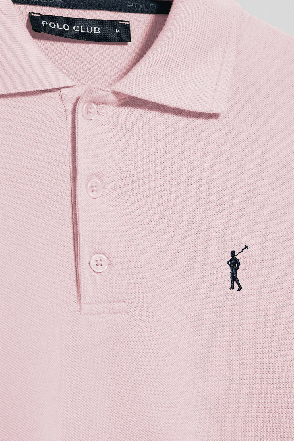 Pink short-sleeve polo shirt with three buttons and Rigby Go embroidered logo - Image 7