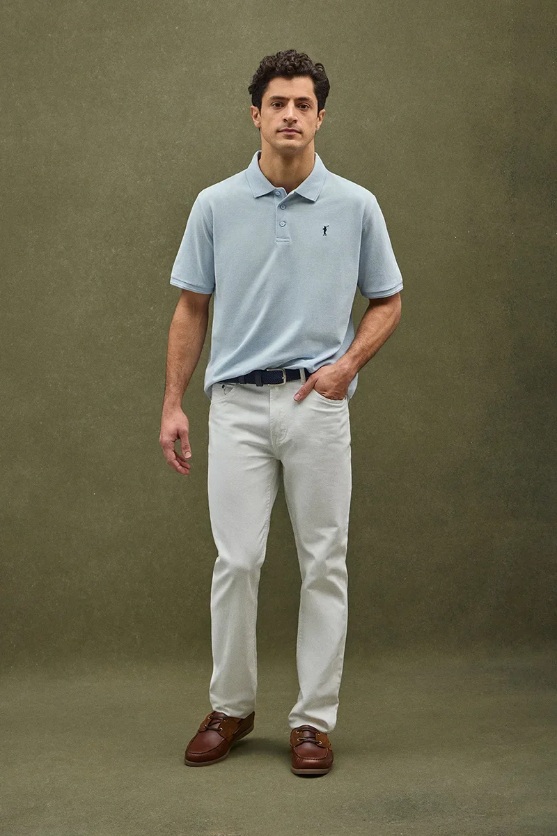 Light-blue short-sleeve polo shirt with Rigby Go embroidered logo