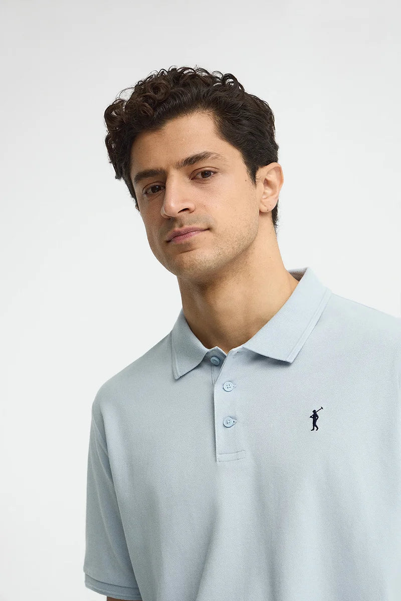 Light-blue short-sleeve polo shirt with Rigby Go embroidered logo - Image 3