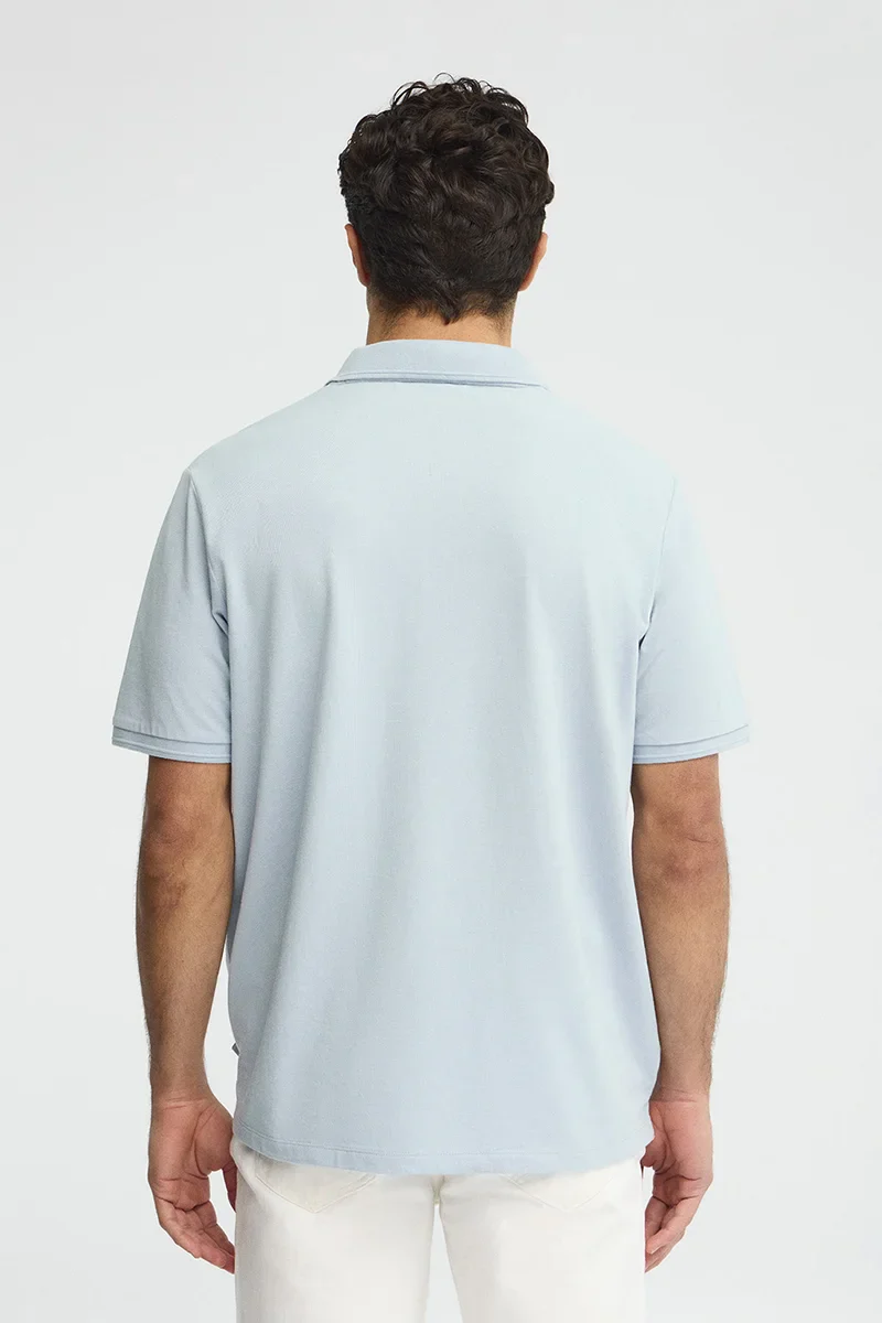 Light-blue short-sleeve polo shirt with Rigby Go embroidered logo - Image 5