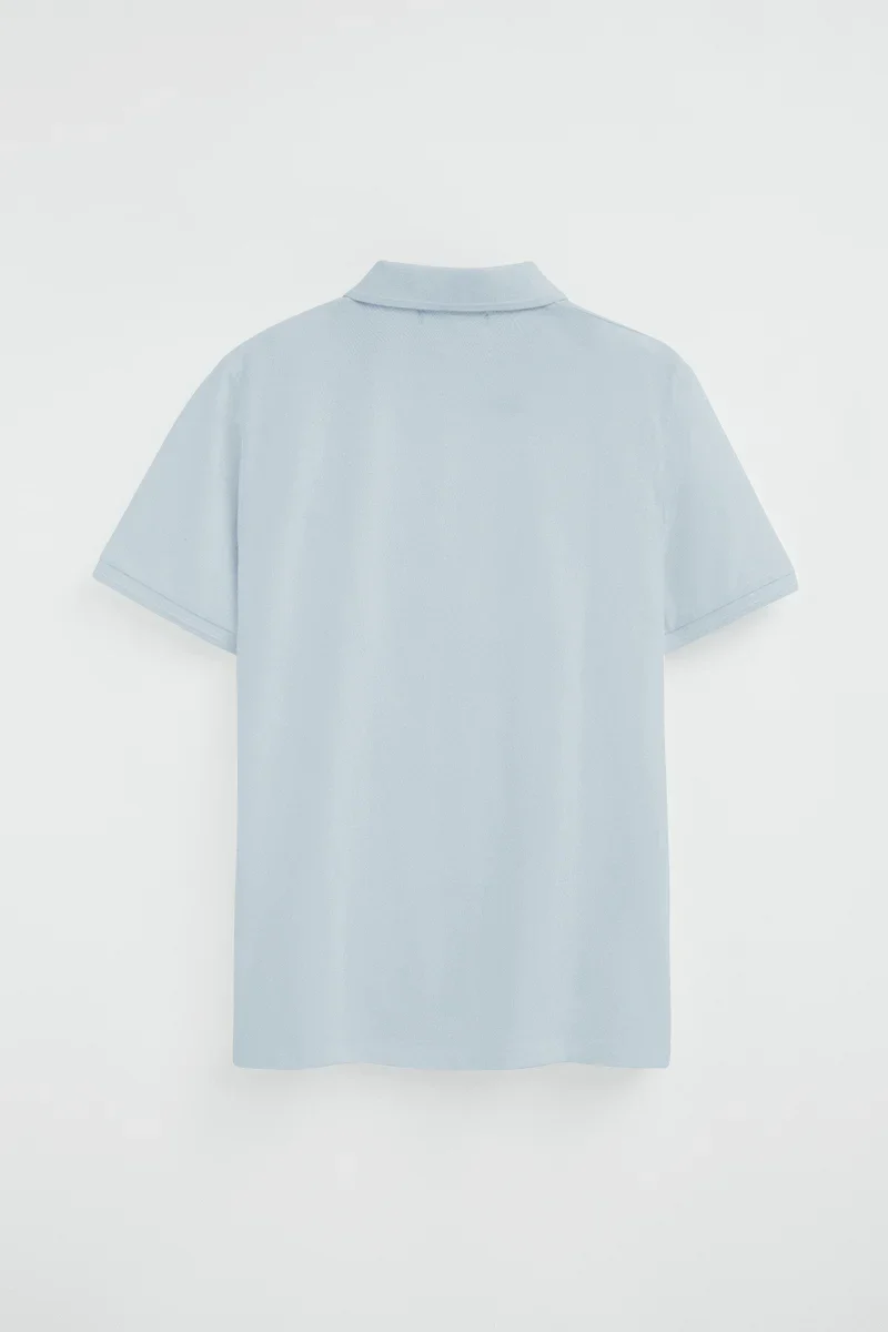 Light-blue short-sleeve polo shirt with Rigby Go embroidered logo - Image 8