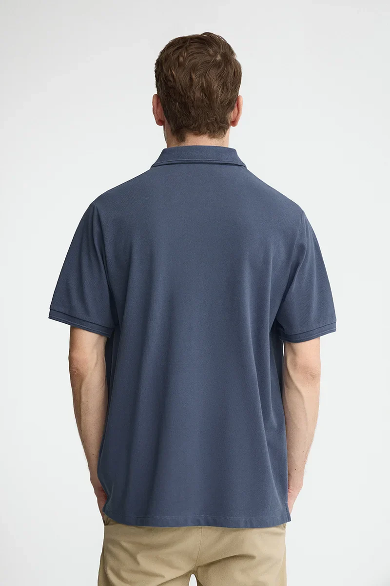 Denim-blue short-sleeve polo shirt with Rigby Go embroidered logo - Image 5