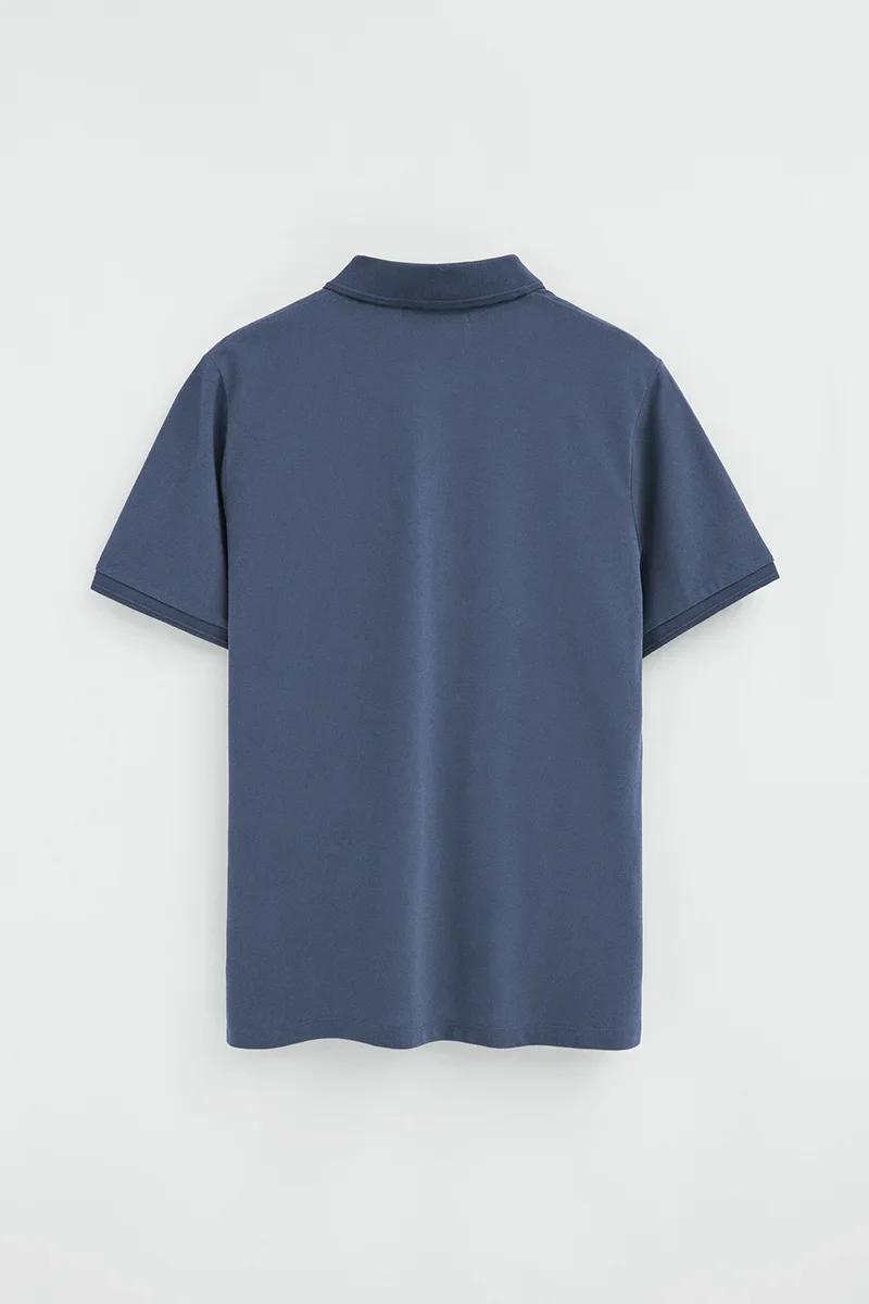 Denim-blue short-sleeve polo shirt with Rigby Go embroidered logo - Image 8