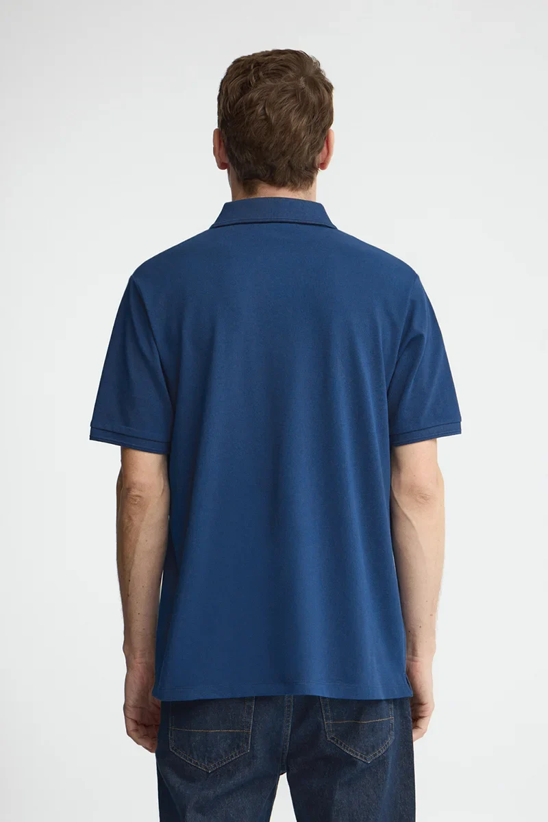 Indigo-blue short-sleeve polo shirt with Rigby Go embroidered logo - Image 5