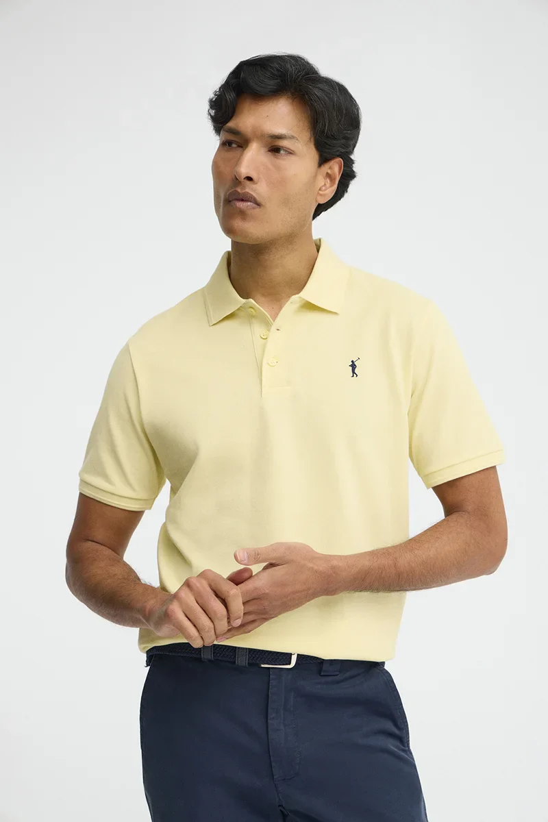 Light-yellow short-sleeve polo shirt with Rigby Go embroidered logo