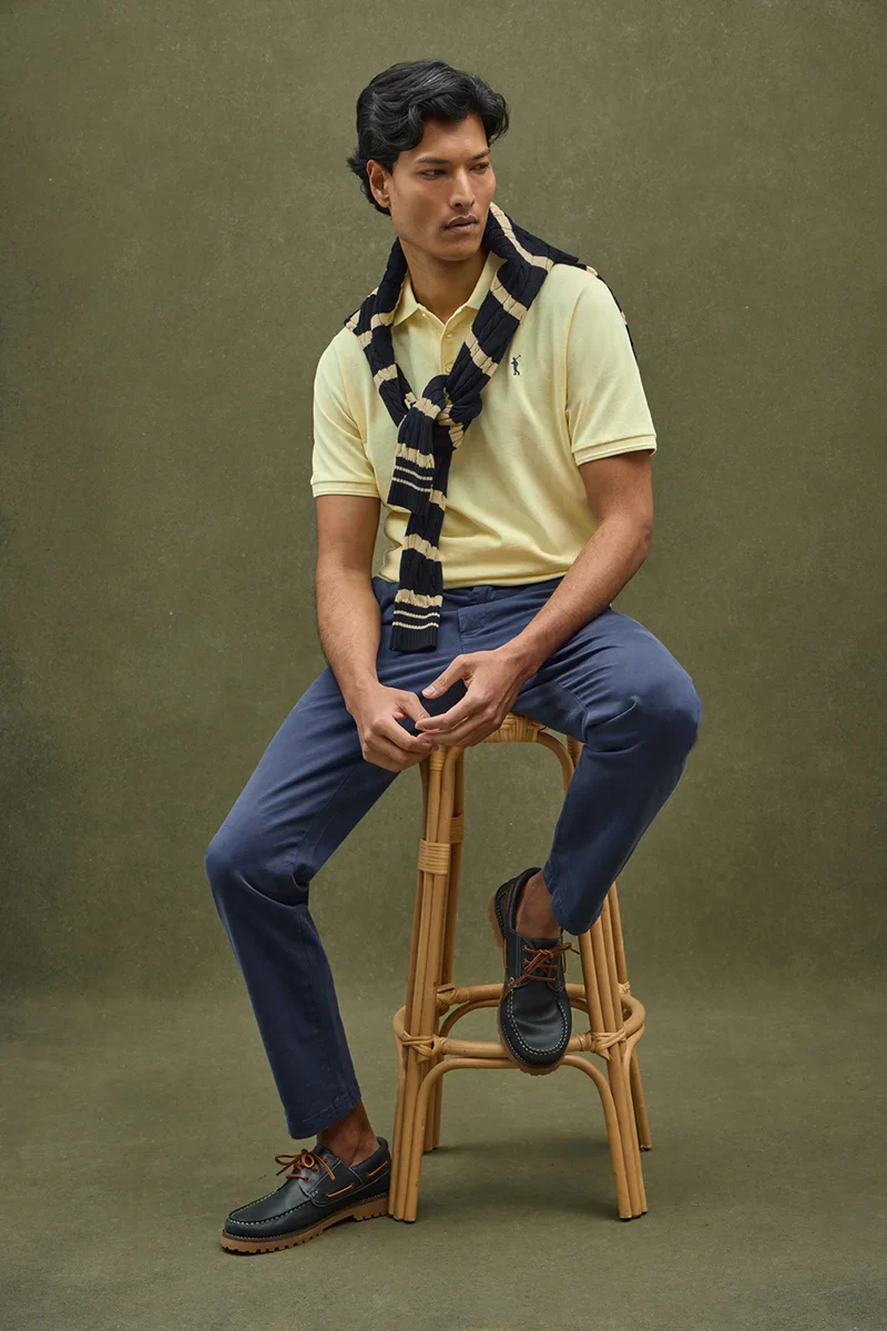 Light-yellow short-sleeve polo shirt with Rigby Go embroidered logo - Image 2