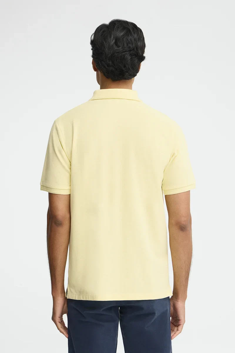 Light-yellow short-sleeve polo shirt with Rigby Go embroidered logo - Image 5