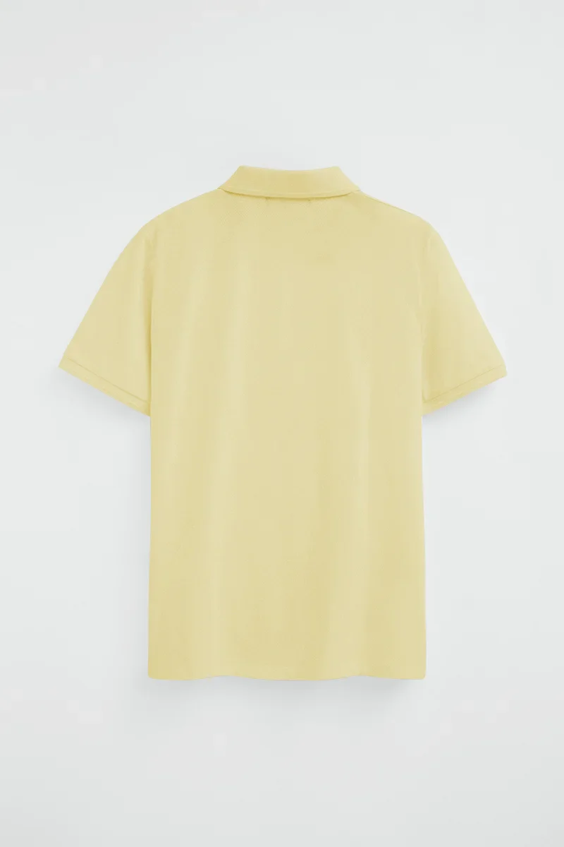 Light-yellow short-sleeve polo shirt with Rigby Go embroidered logo - Image 8