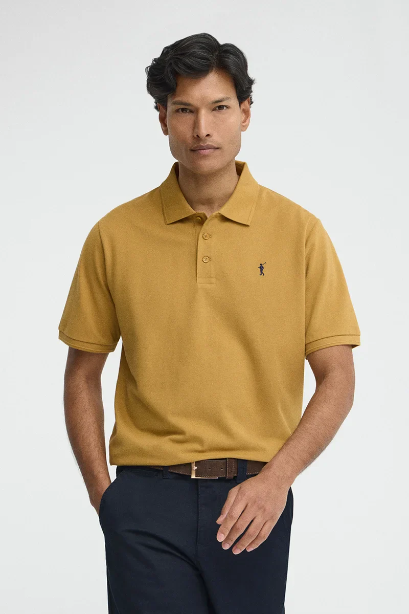 Mustard short-sleeve polo shirt with Rigby Go embroidered logo