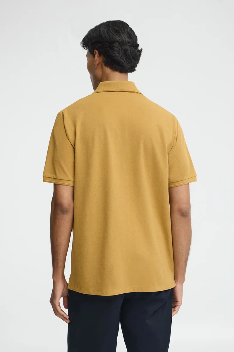 Mustard short-sleeve polo shirt with Rigby Go embroidered logo - Image 4