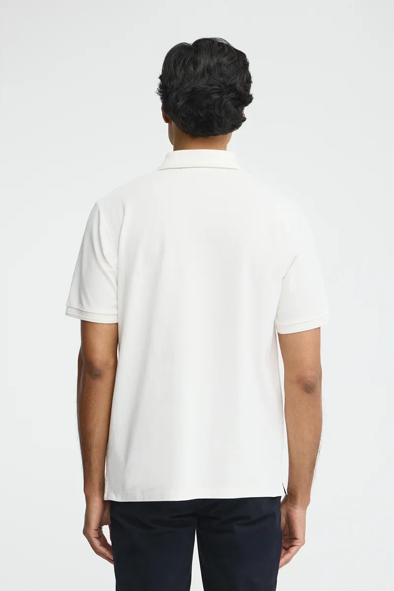 Nude short-sleeve polo shirt with Rigby Go embroidered logo - Image 5