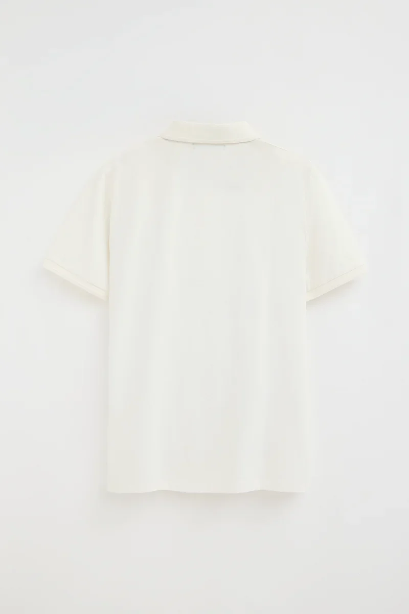 Nude short-sleeve polo shirt with Rigby Go embroidered logo - Image 8