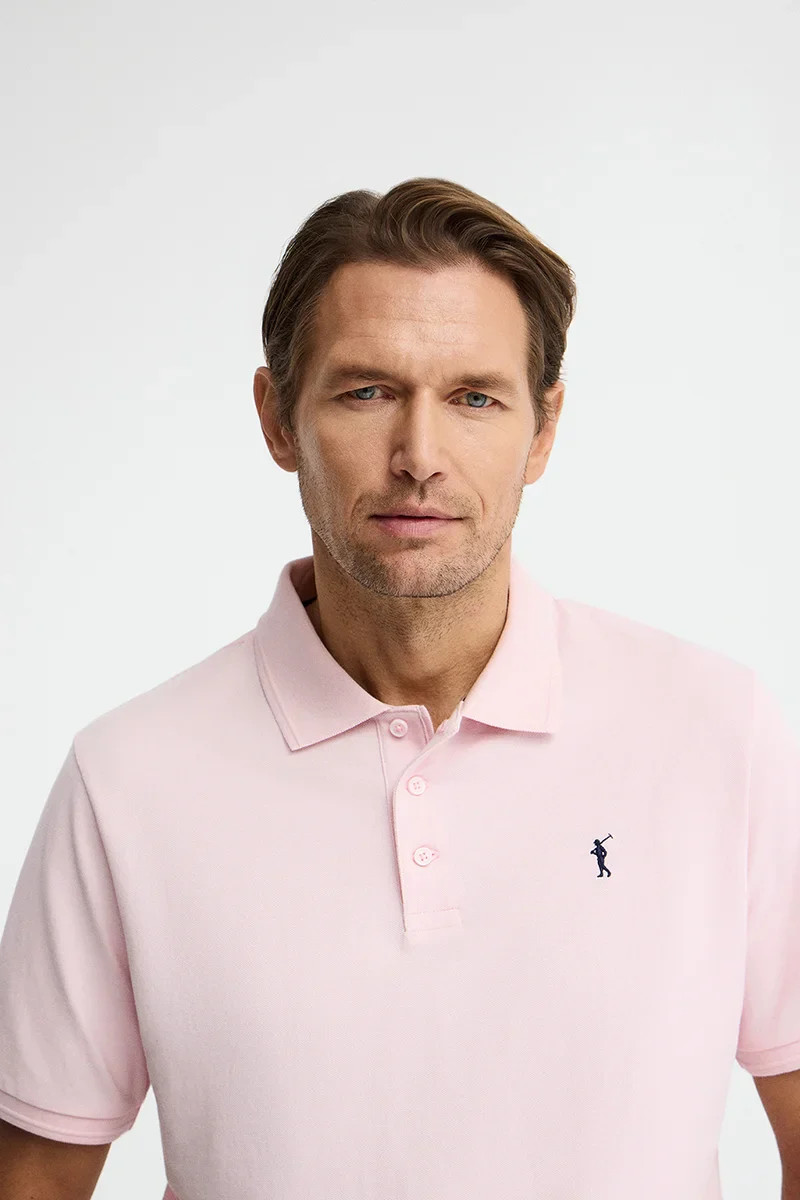 Pink short-sleeve polo shirt with Rigby Go embroidered logo - Image 3