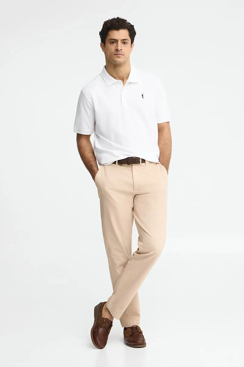 White short-sleeve polo shirt with Rigby Go embroidered logo - Image 4