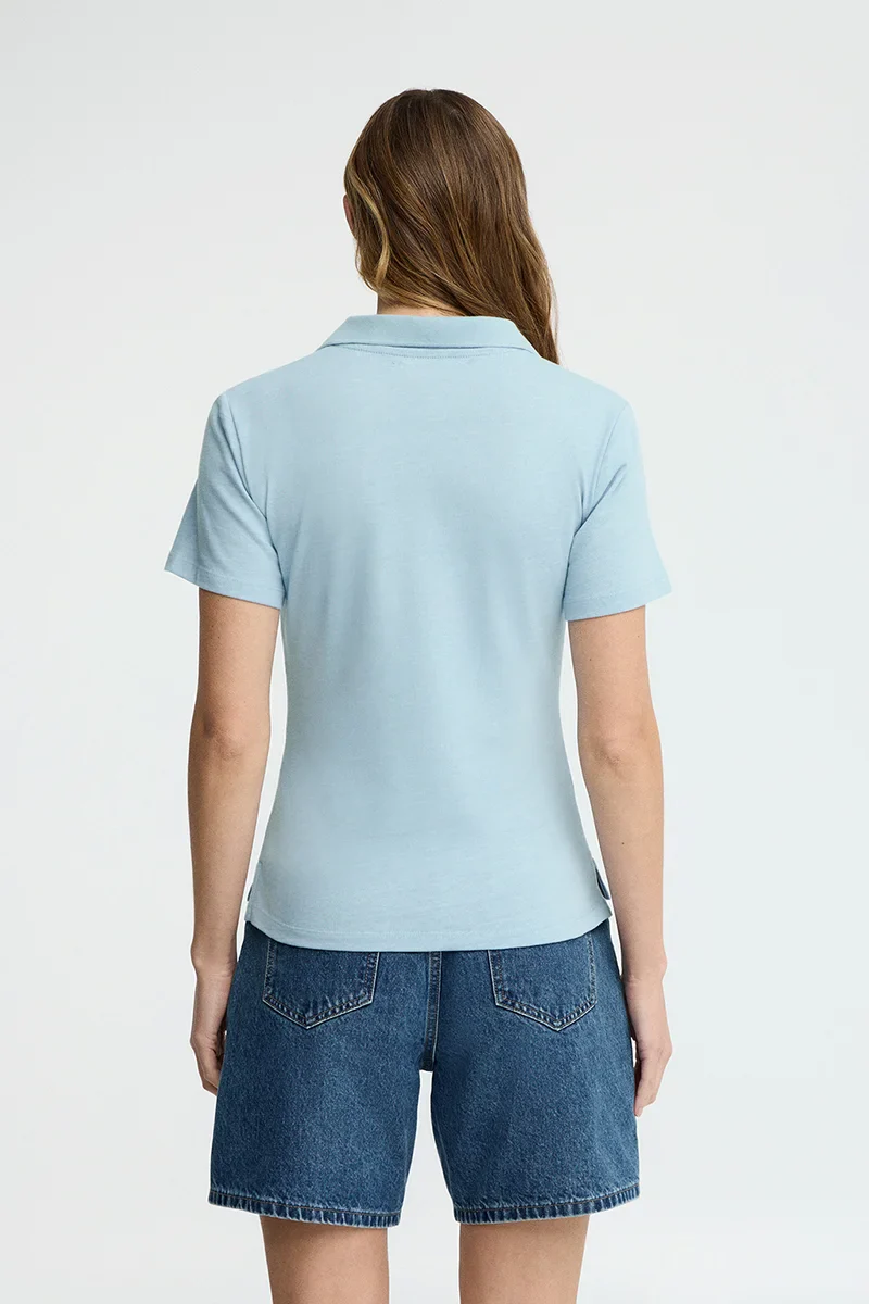 Light-blue cotton-linen polo shirt with buttonless collar and Rigby Go embroidery - Image 4