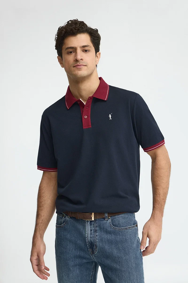 Navy-blue polo shirt with contrast details and Rigby Go embroidery