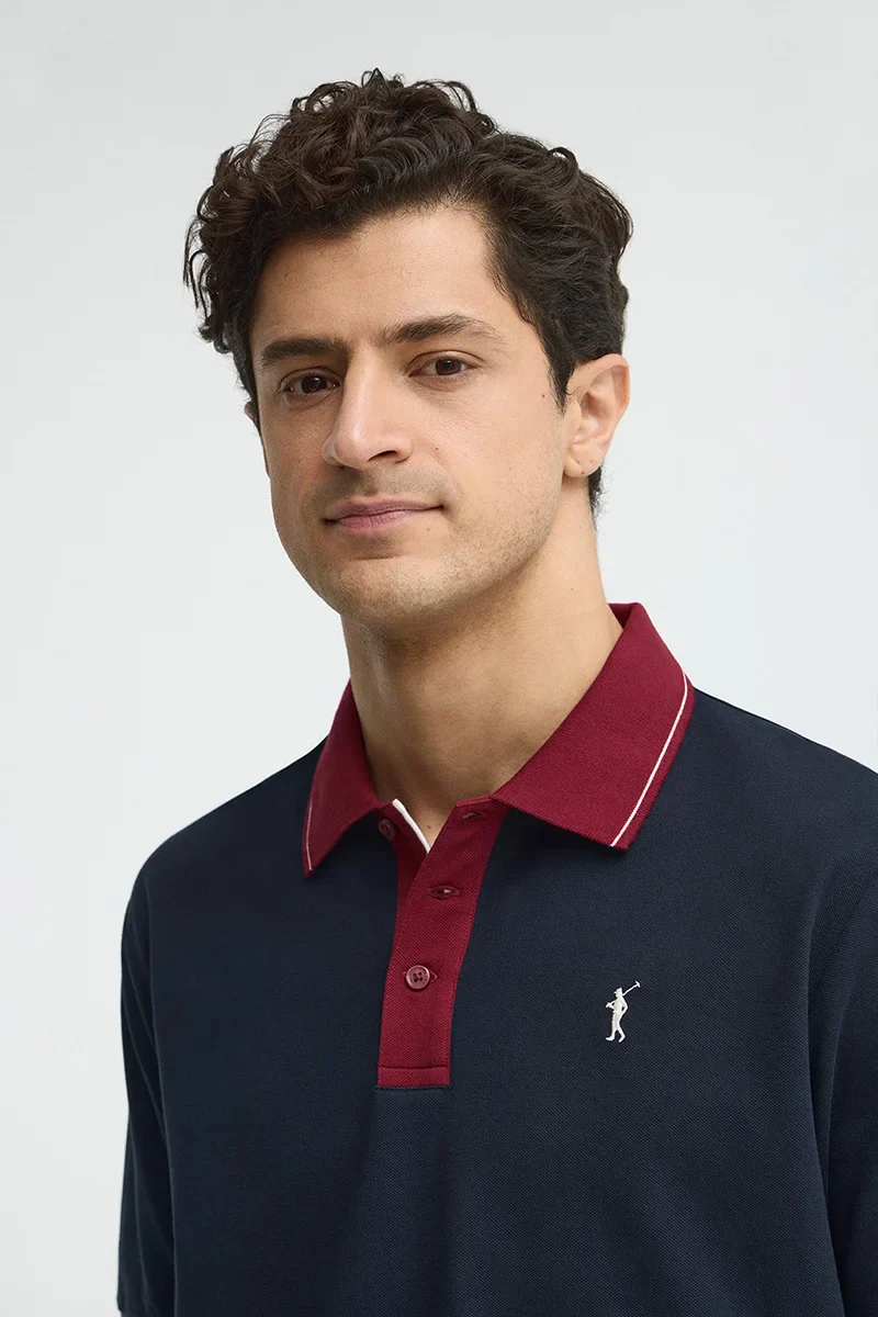 Navy-blue polo shirt with contrast details and Rigby Go embroidery - Image 3