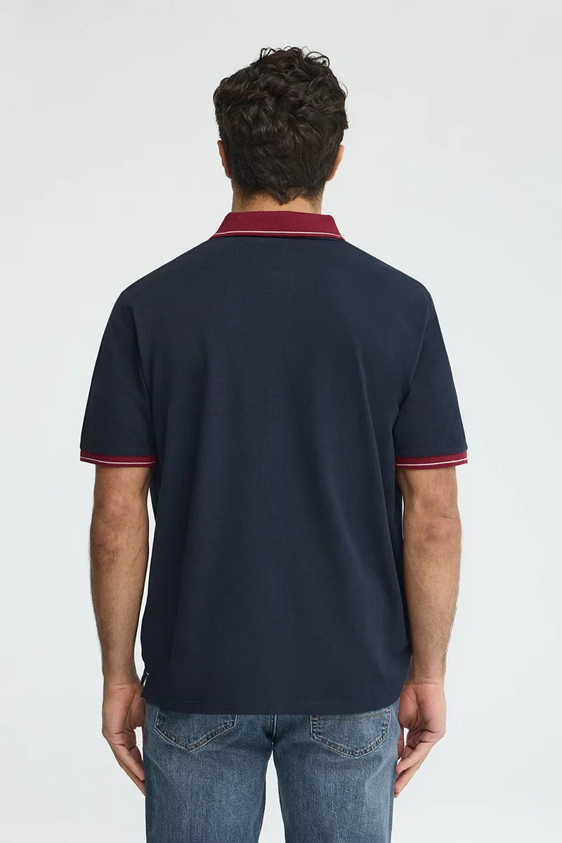 Navy-blue polo shirt with contrast details and Rigby Go embroidery - Image 5