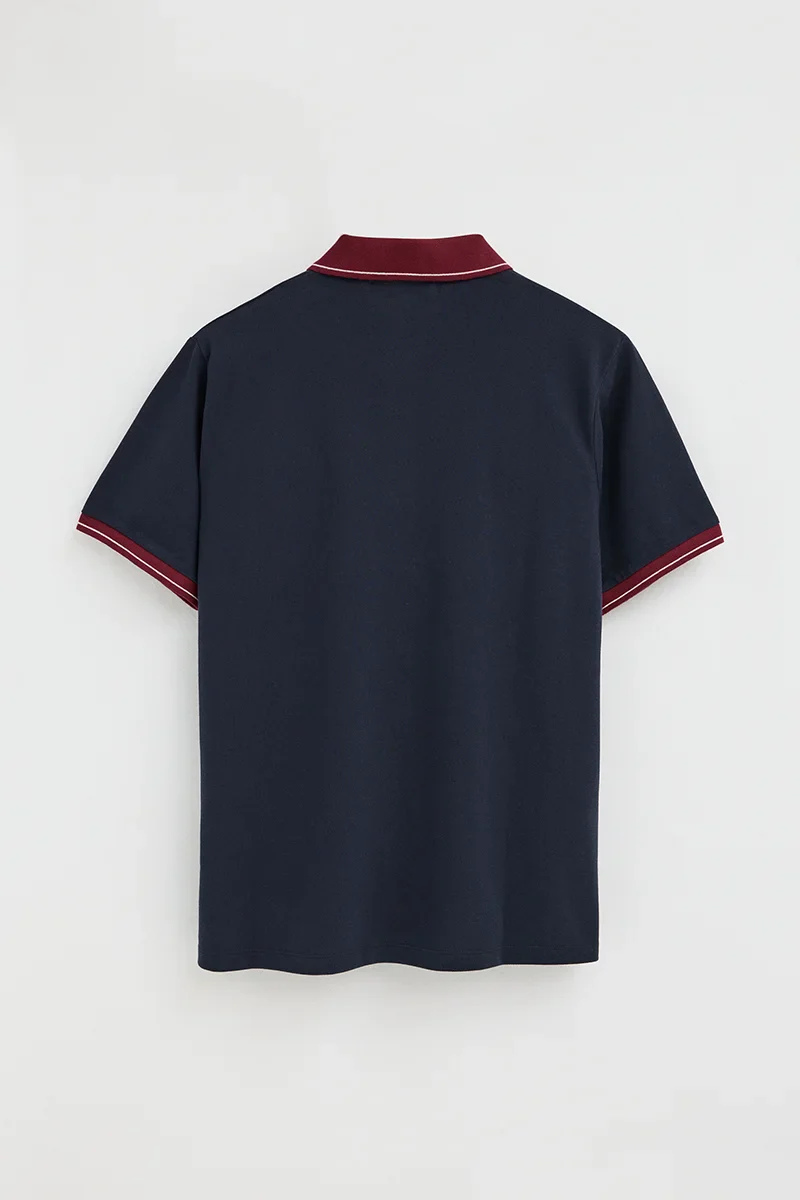 Navy-blue polo shirt with contrast details and Rigby Go embroidery - Image 8