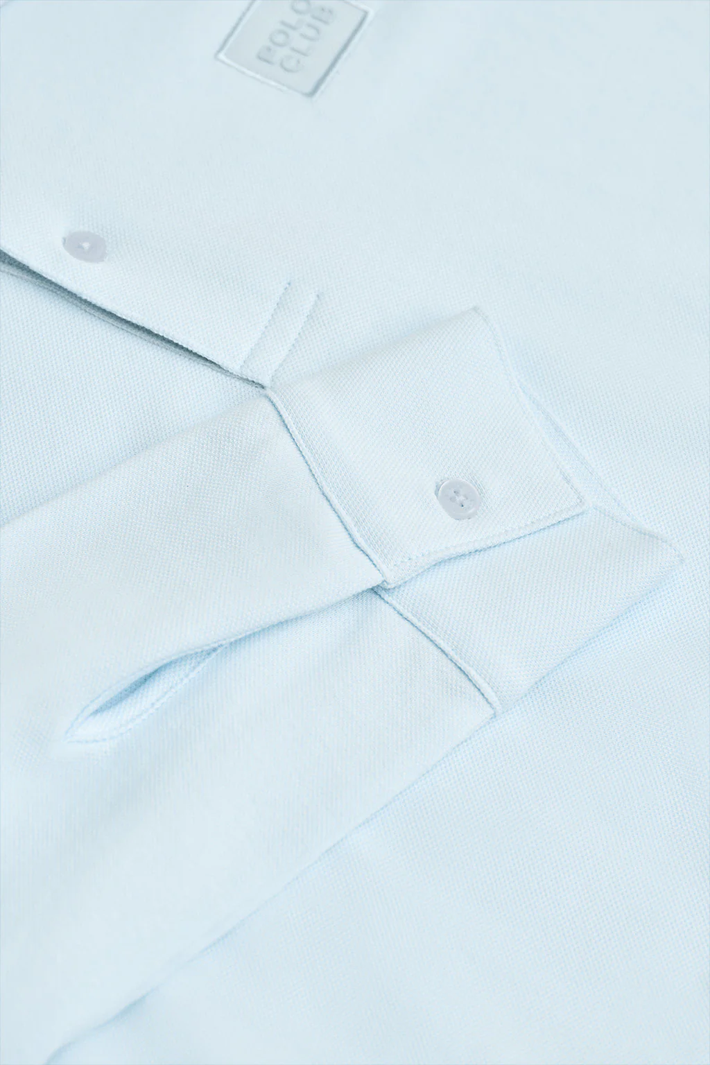 Light-blue long-sleeve polo shirt with two buttons and branded patch - Image 7