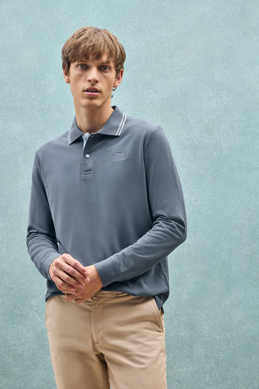 Denim-blue long-sleeve polo shirt with two buttons and branded patch - Image 11