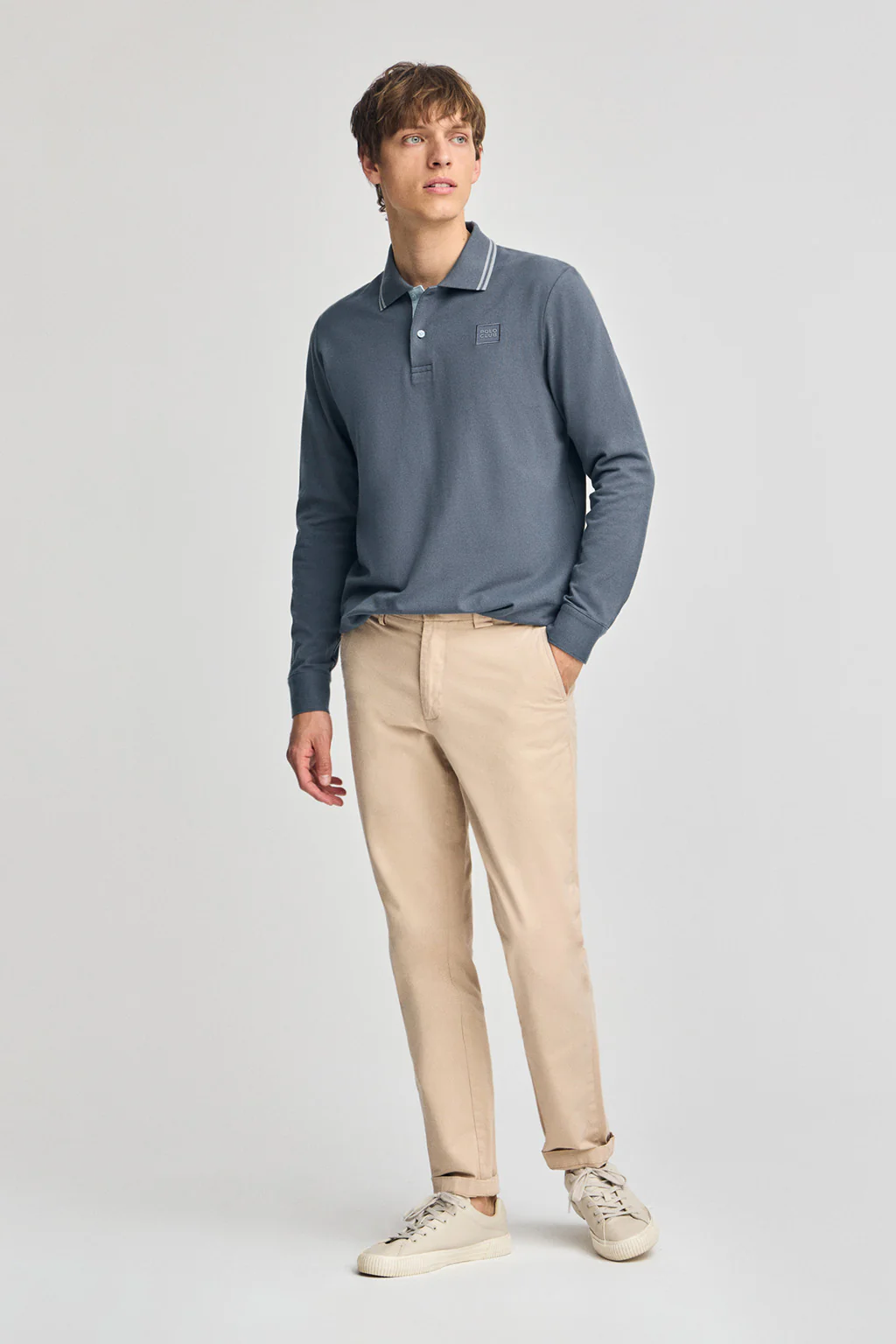Denim-blue long-sleeve polo shirt with two buttons and branded patch - Image 4