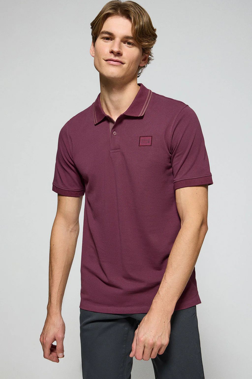 Plum polo shirt with two buttons and Polo Club logo