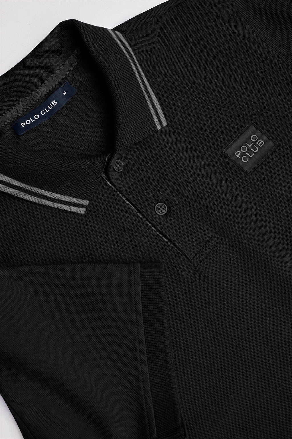 Black short-sleeve polo shirt with two buttons and chest detail - Image 6