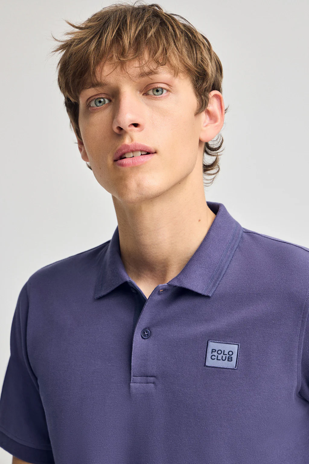 Blue-violet short-sleeve polo shirt with two buttons and chest detail - Image 3
