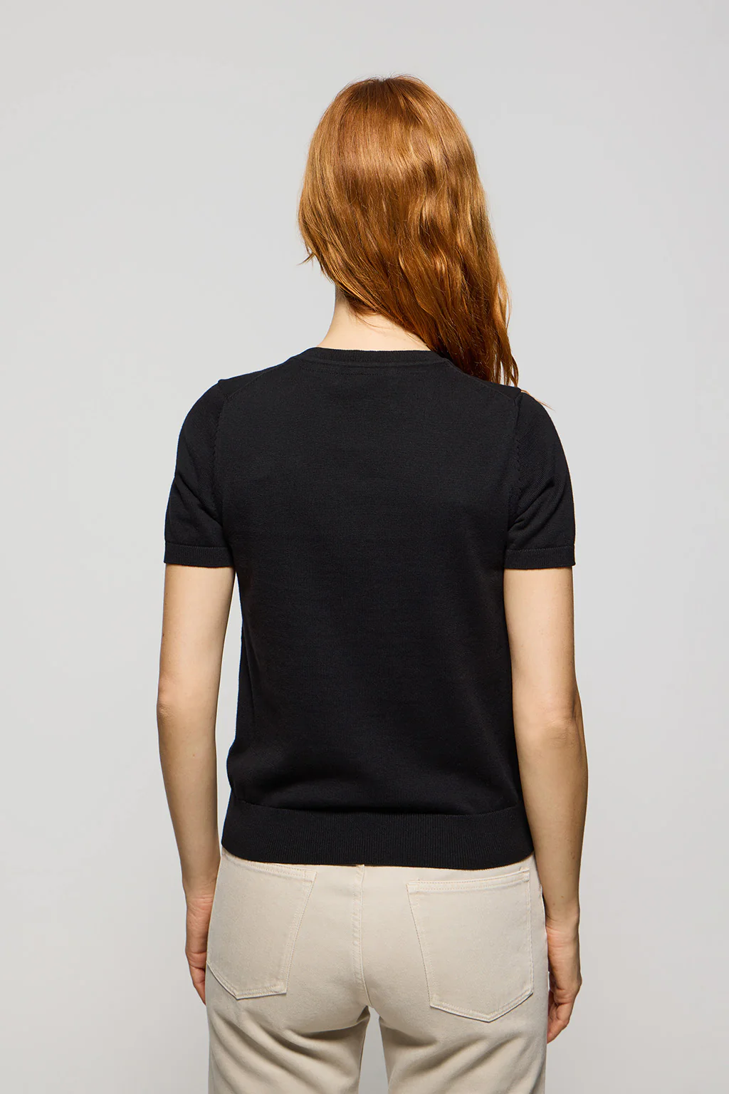 Black round-neck short-sleeve knit jumper with embroidered logo in matching colour - Image 5