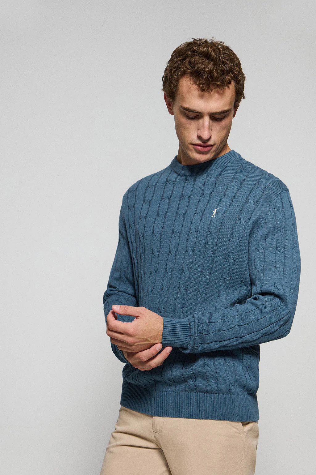 Denim-blue cable-knit jumper with Rigby Go logo - Image 3