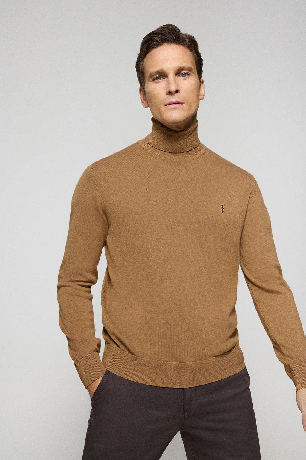 Camel turtleneck knit jumper with Rigby Go embroidered logo