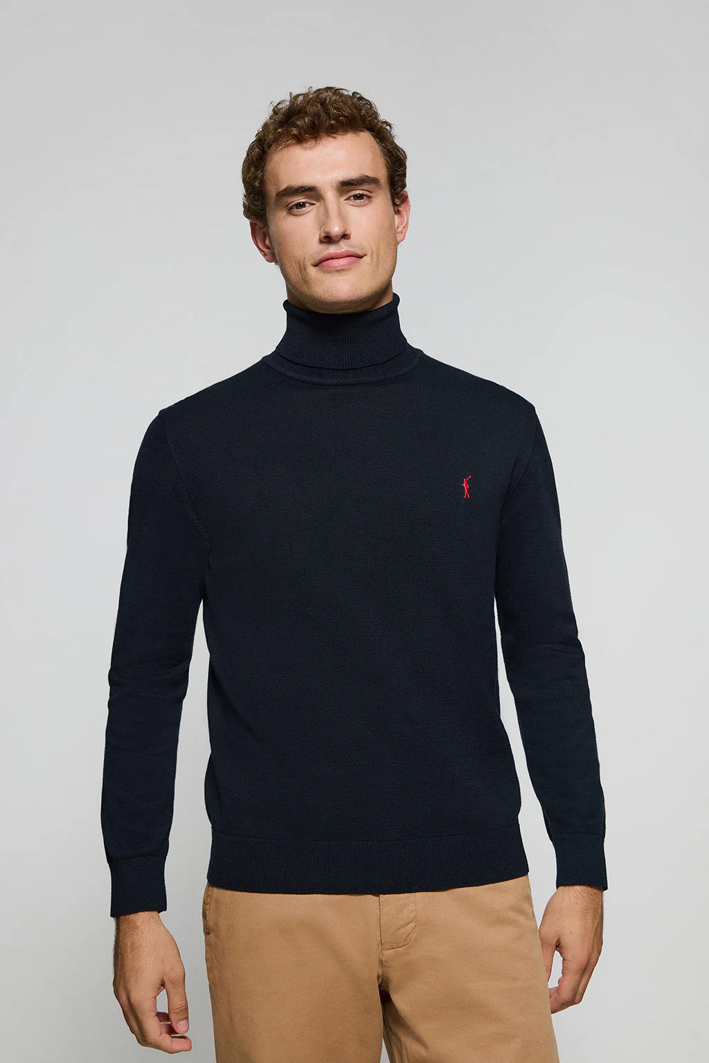 Navy-blue turtleneck knit jumper with Rigby Go embroidered logo