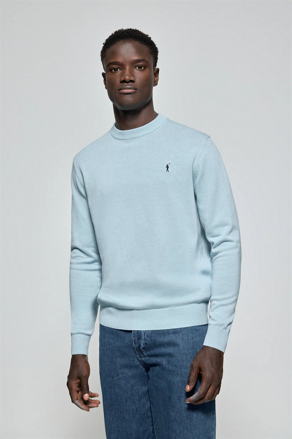 Light-blue round-neck knit jumper with Rigby Go embroidered logo