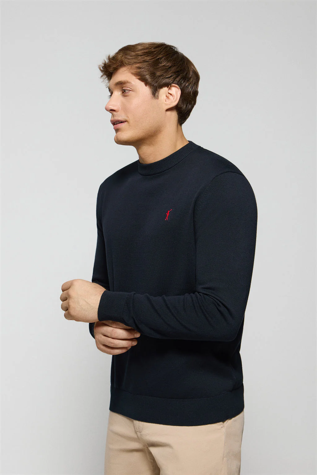 Navy-blue round-neck knit jumper with Rigby Go embroidered logo