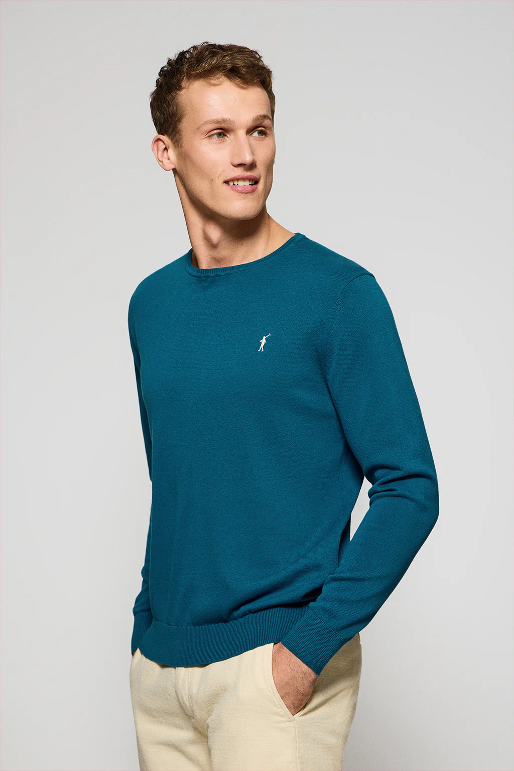 Greenish-blue round-neck knit jumper with Rigby Go embroidery
